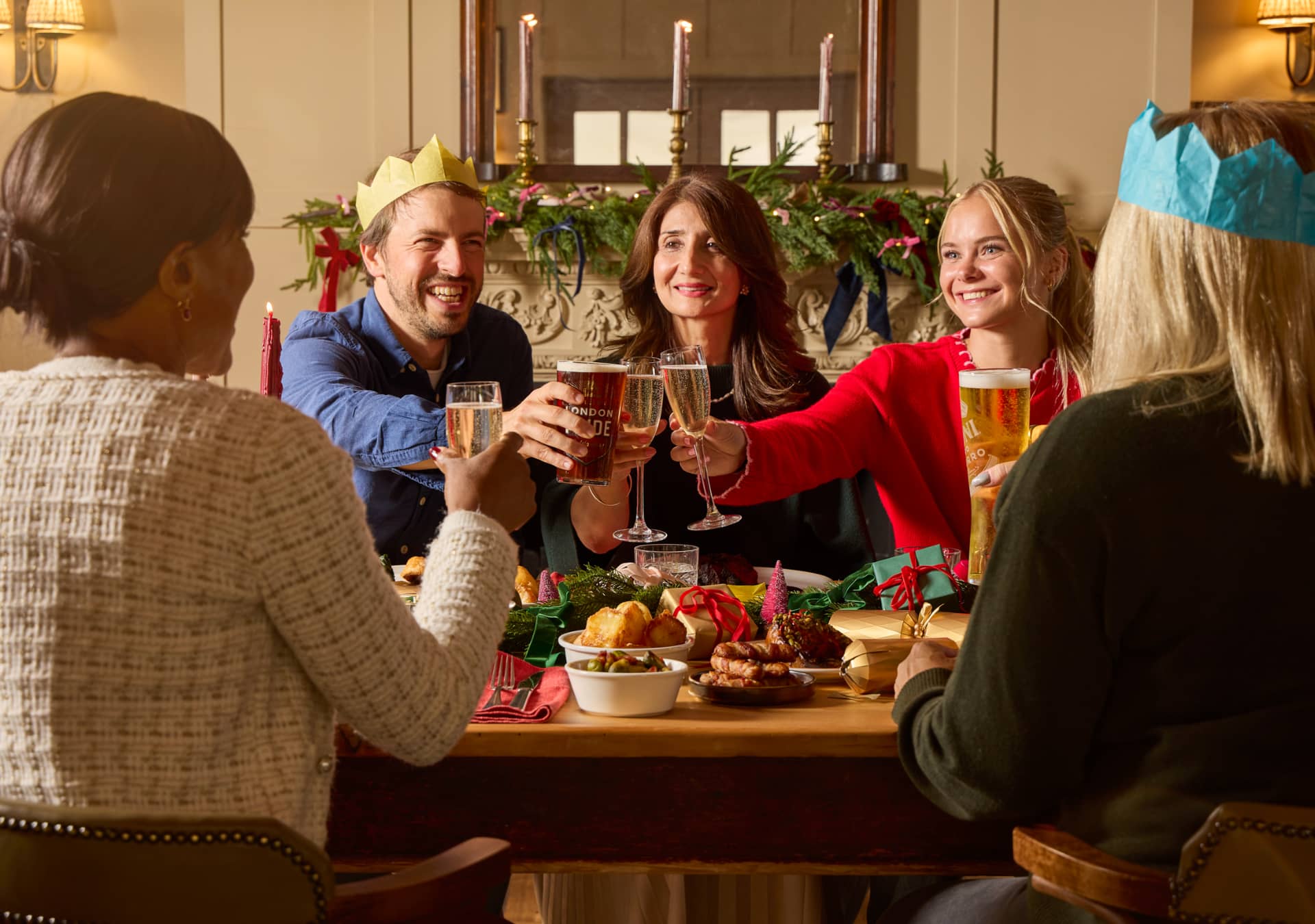 Group enjoying festive dinner in a local pub